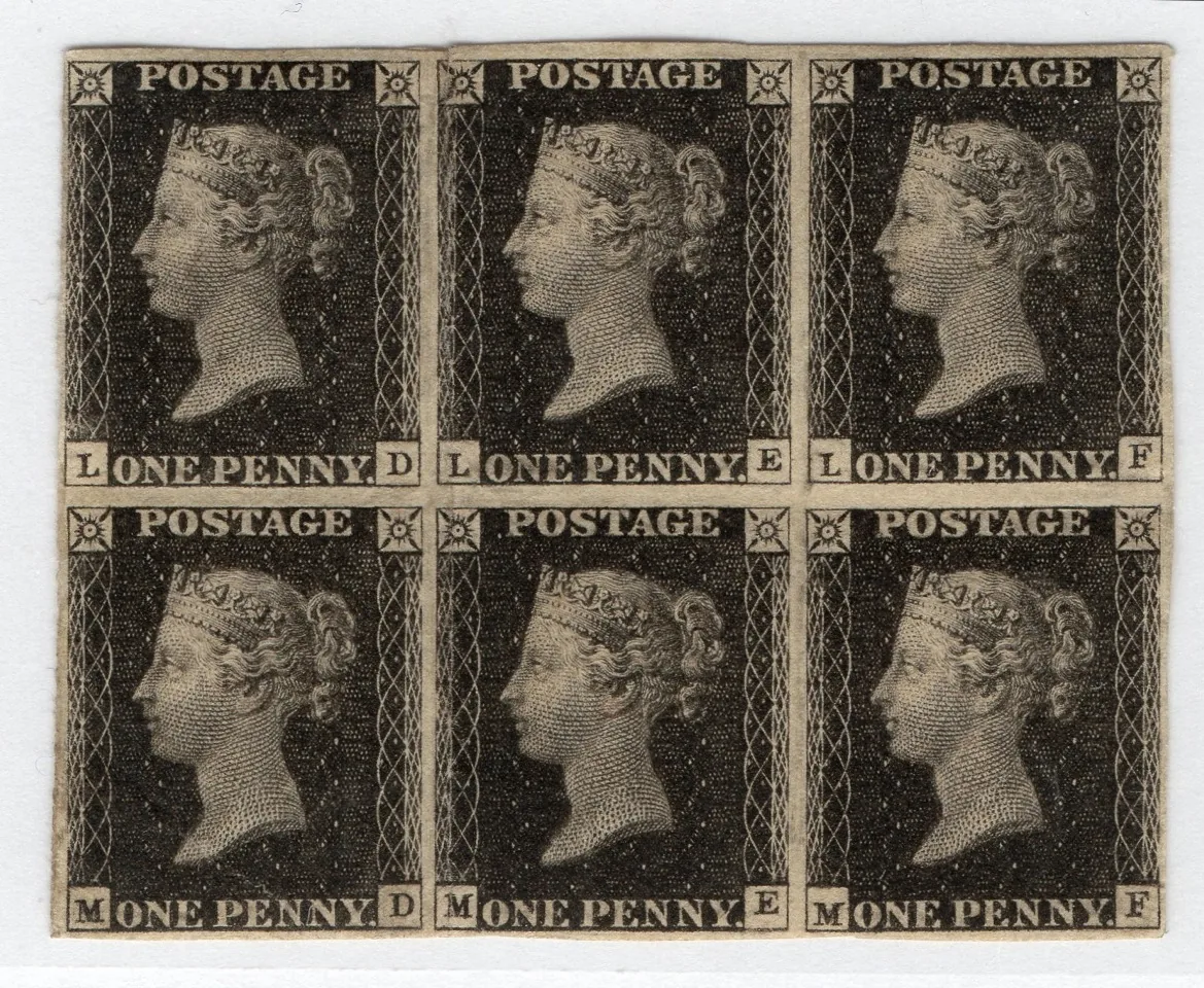 A block of six one penny stamp from the UK.