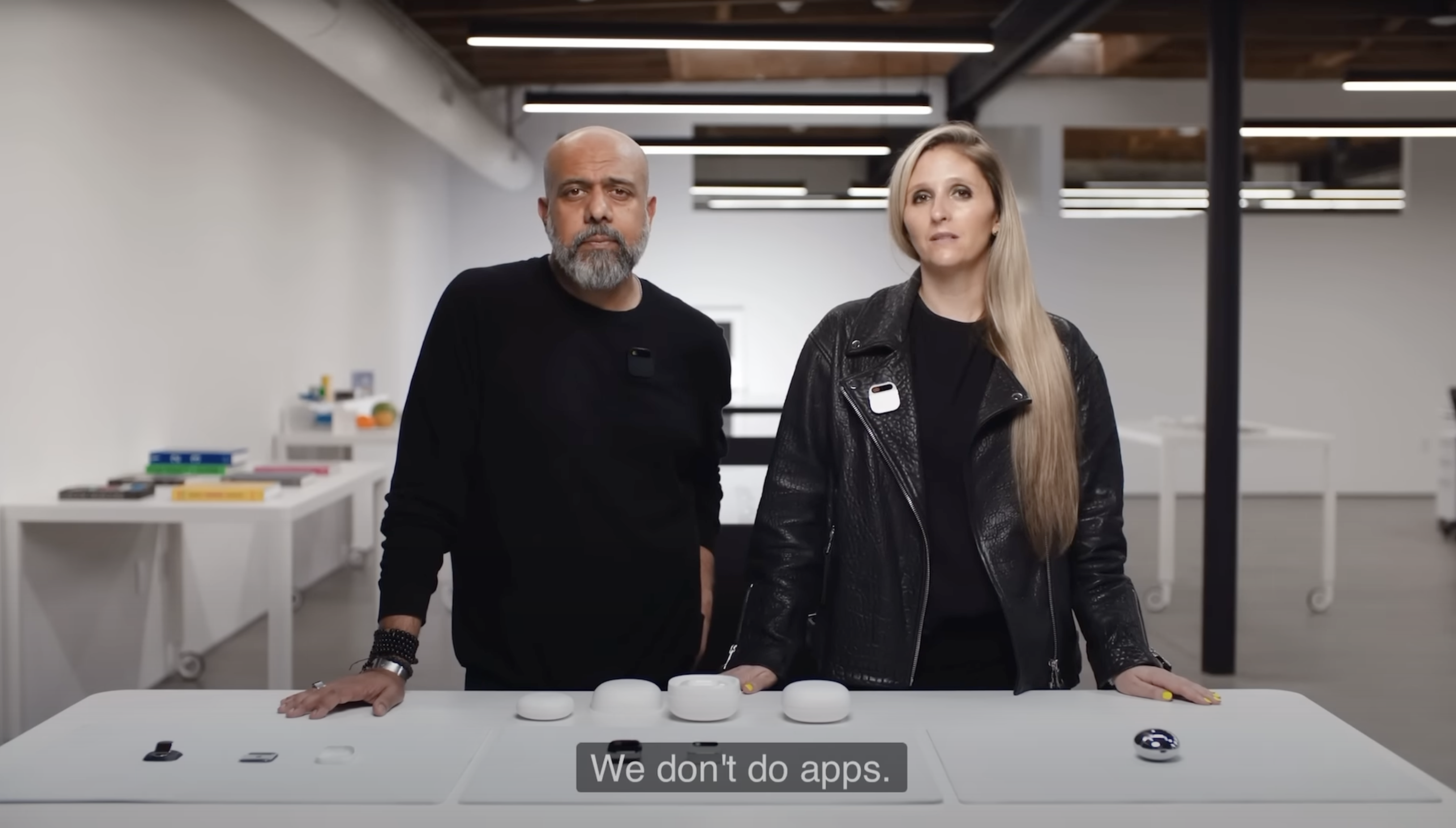 The image features Imran Chaudhri and Bethany Bongiorno, founders of Humane, presenting their AI Pin.